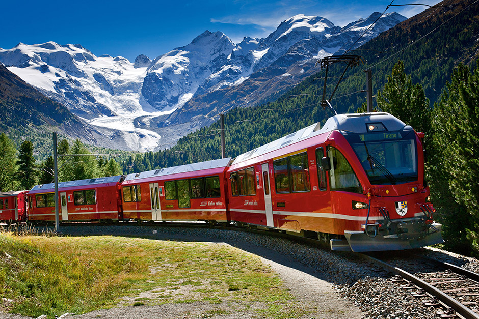 Train travelling through Swiss Alps