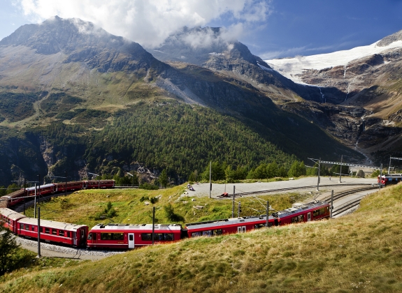 the bernina express going through swiss countryside