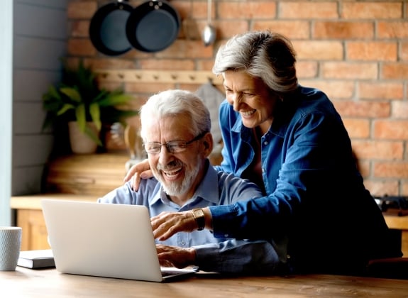 happy couple watching railbookers webinars
