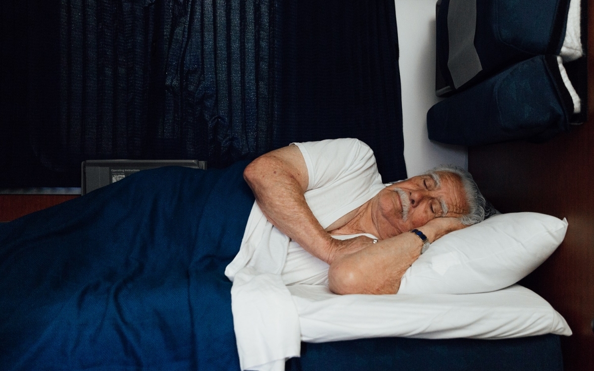 man sleeping in Amtrak's accessible bedroom
