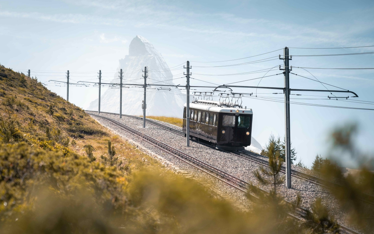 the gornergrat train exterior traveling in summer