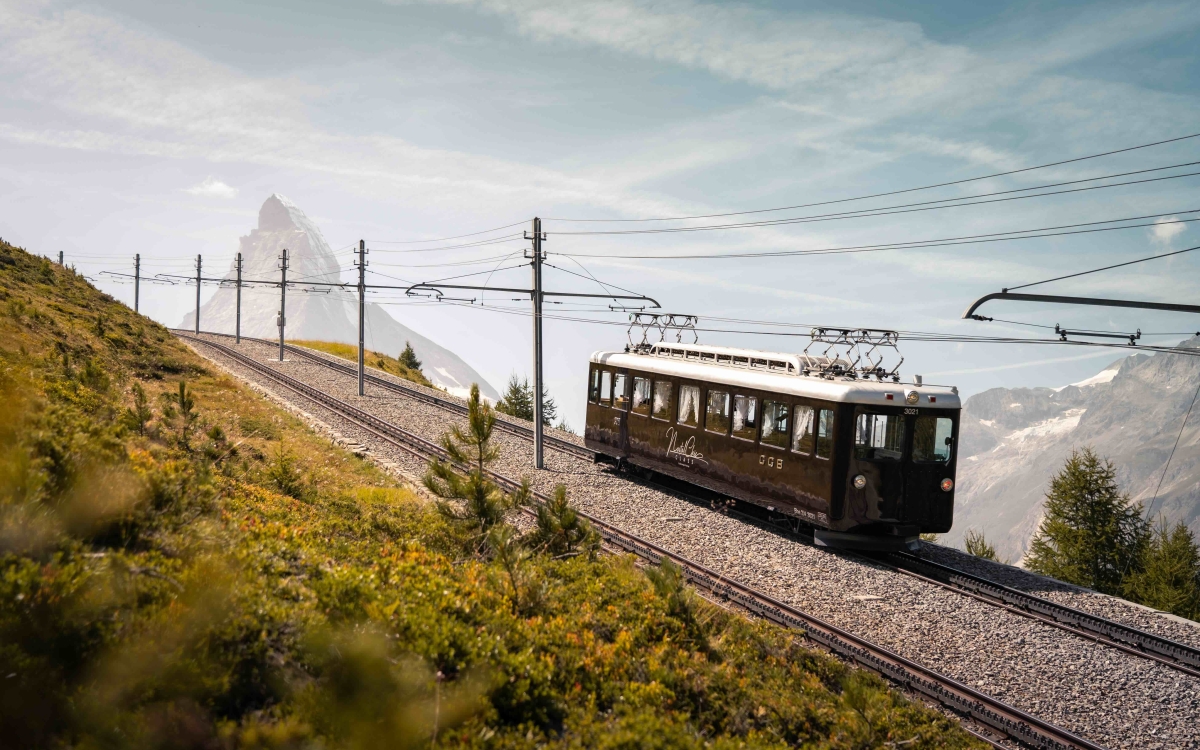 the gornergrat train exterior traveling in summer