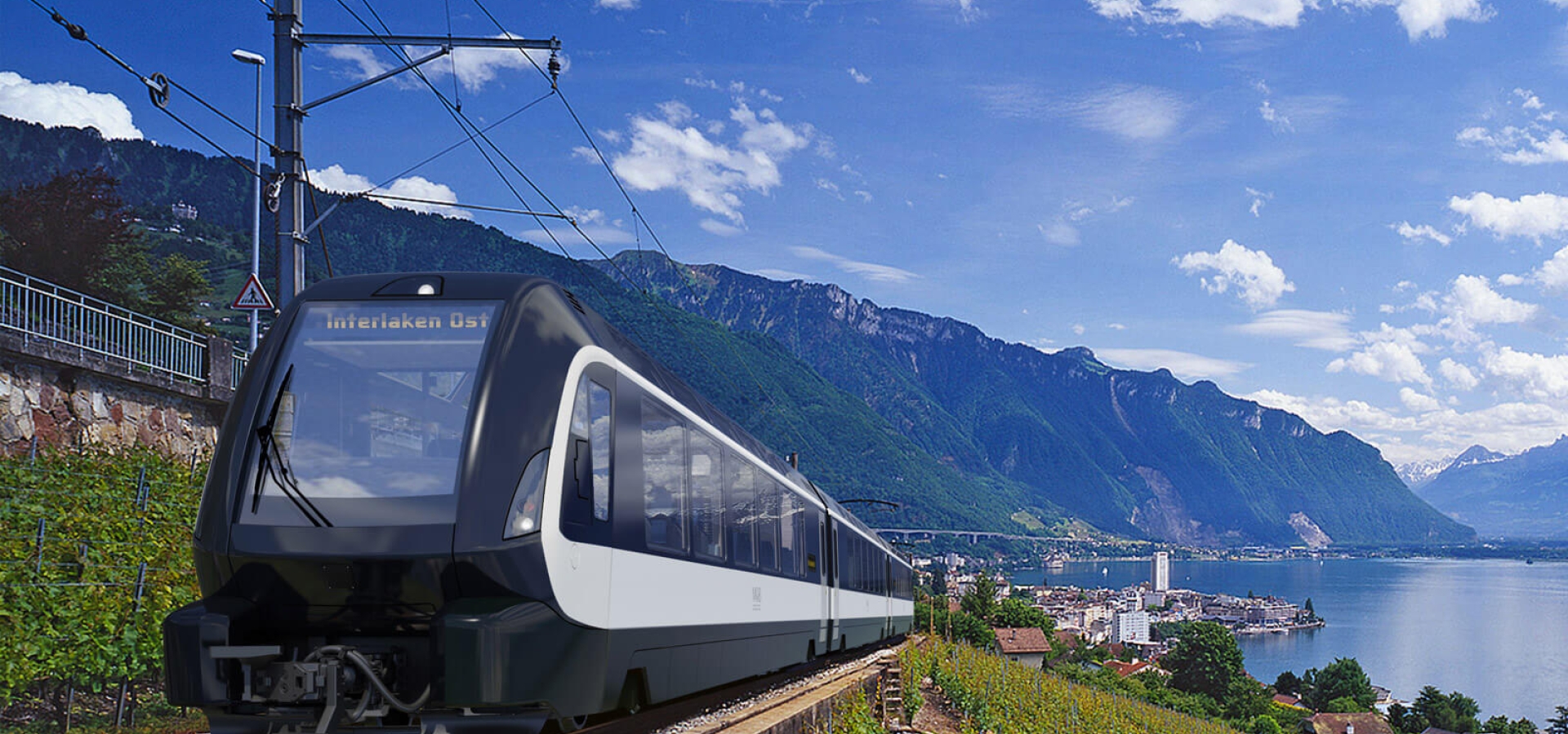 Golden Pass Express train on grassy hillside