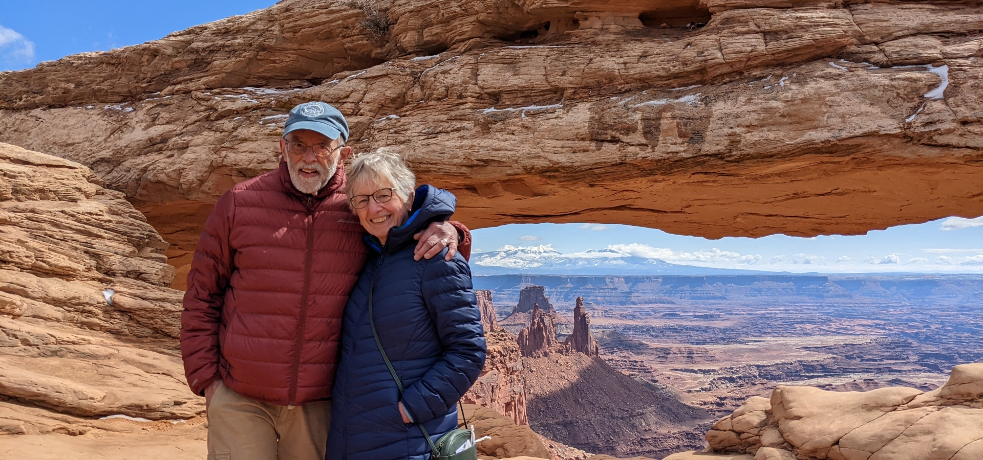 Happy Travellers at Arches and Canyonlands National Park Couple at Canyonlands Mesa Arch National Park