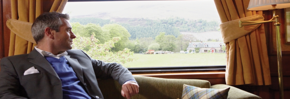Belmond Onboard - Man in Window Belmond Onboard - Man in Window