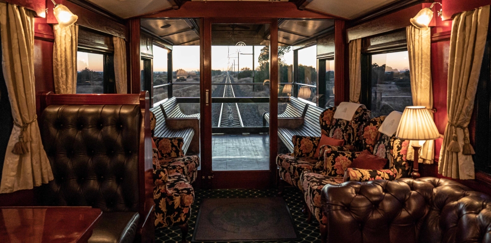 rovos rail observation car during sunrise with Railbookers