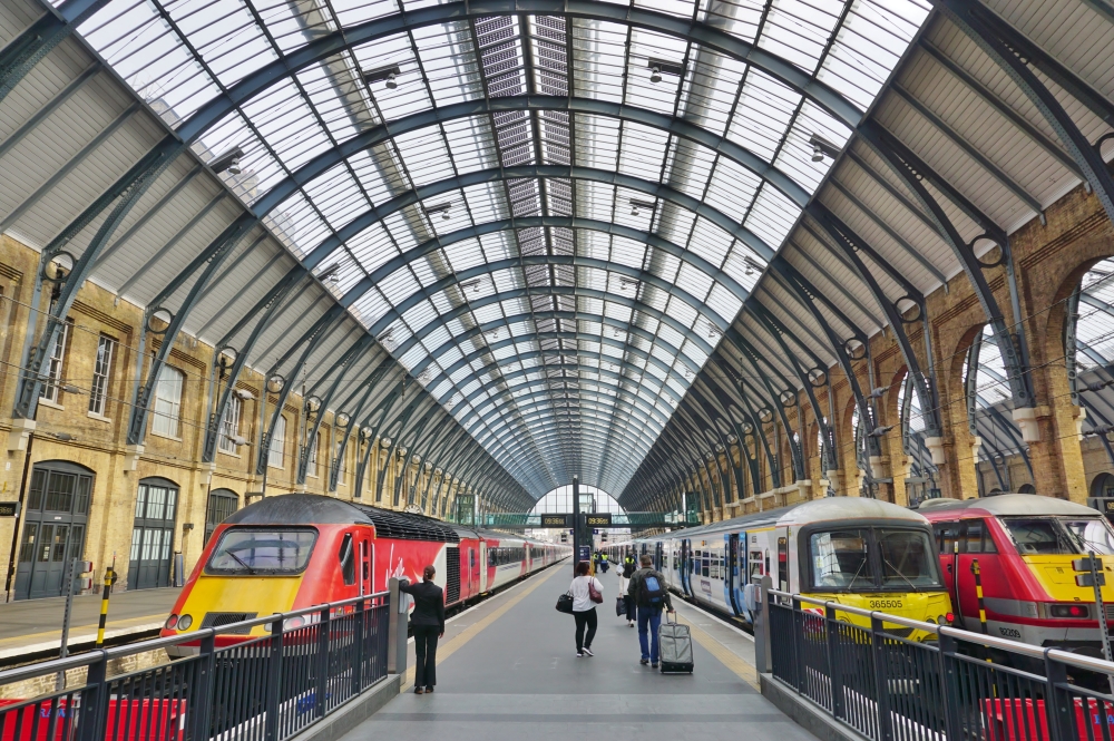Inside UK rail station A train station with 2 platforms, trains ready to board